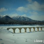 Hiking on ice and snow to taushubetsu river bridge